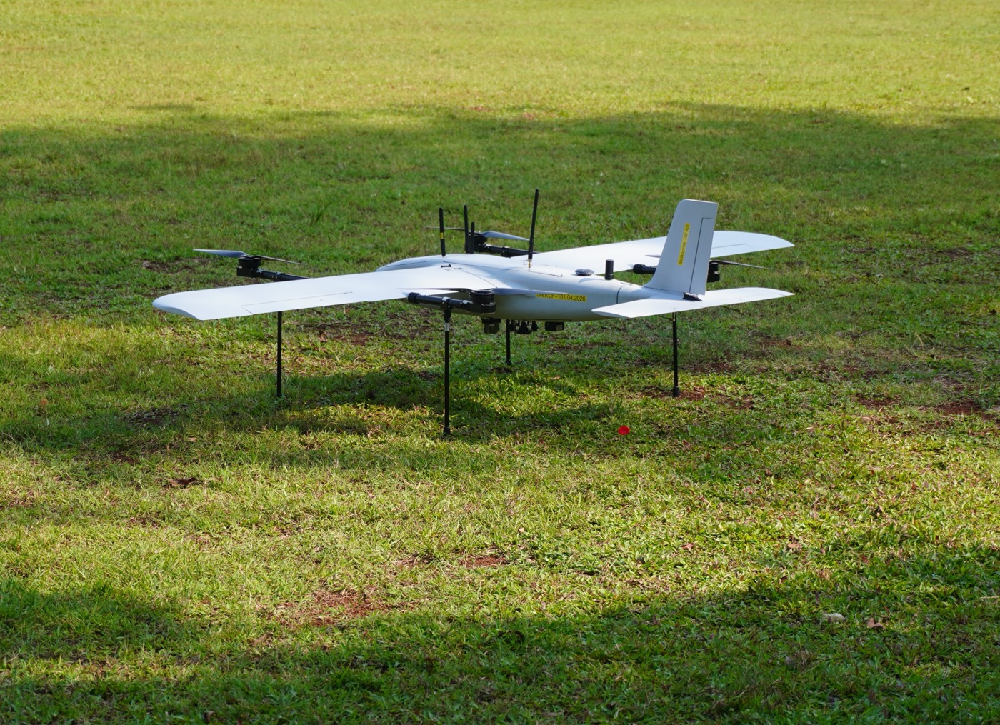 KCF-15 standing on a grass field ready for vertical take-off